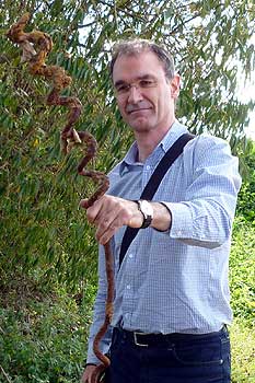 Dr Jeff McNeill holding the base of German barbed wire stake found at Messines, designed to be screwed quietly into the ground to avoid noisy hammering that could attract a machine gun attack